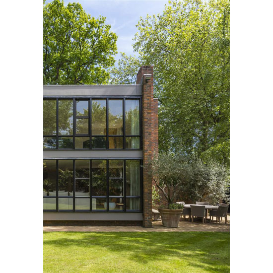 1970s Royston Summers lakeside modernist house in Esher, Surrey
