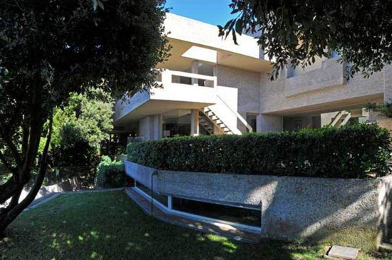 1970s Frank Lloyd Wright-inspired 20-bedroom coastal mansion in Rossignano Marittimo, Tuscany, Italy