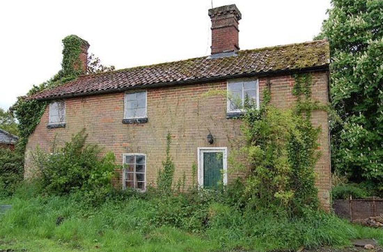 Once-restored five-storey mill and cottage in Diss, Norfolk