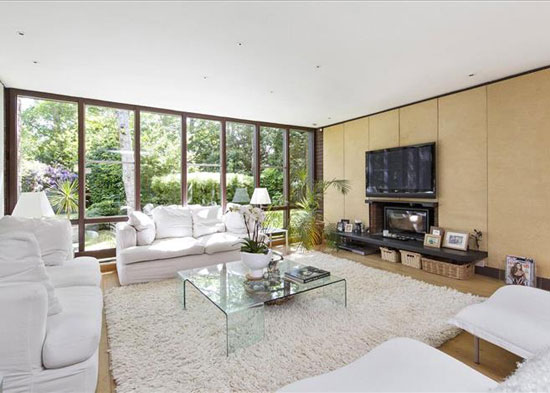 1970s Royston Summers-designed modernist lakeside house in Esher, Surrey