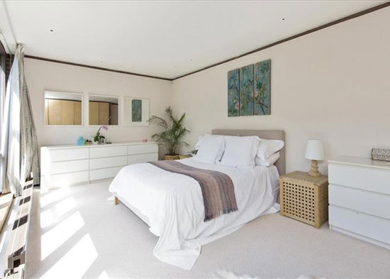 1970s Royston Summers-designed modernist lakeside house in Esher, Surrey