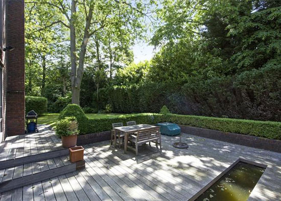 1970s Royston Summers-designed modernist lakeside house in Esher, Surrey