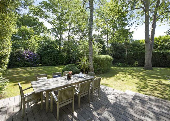 1970s Royston Summers-designed modernist lakeside house in Esher, Surrey