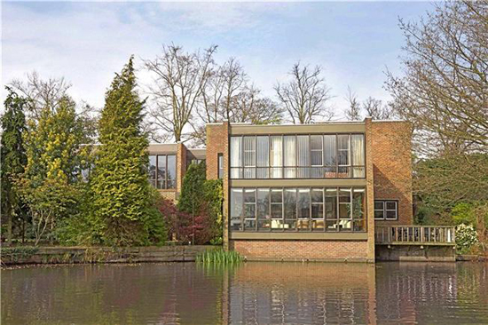 On the market: 1970s Royston Summers-designed lakeside modernist property in Esher, Surrey