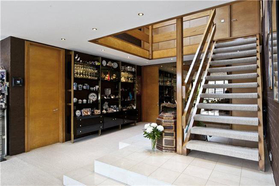 On the market: 1970s Royston Summers-designed lakeside modernist property in Esher, Surrey