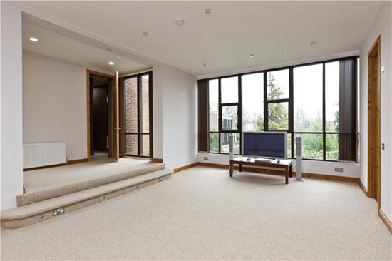 On the market: 1970s Royston Summers-designed lakeside modernist property in Esher, Surrey