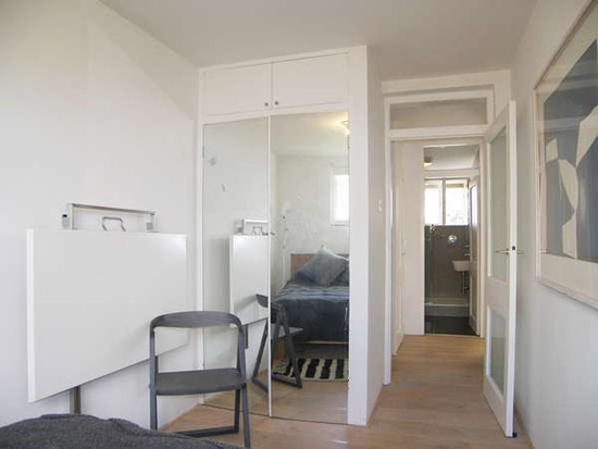 Three-bedroom apartment in the grade II-listed 1950s Langham House Close, Richmond upon Thames, Surrey