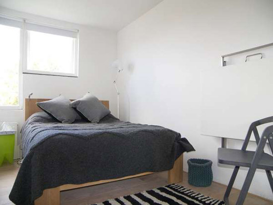Three-bedroom apartment in the grade II-listed 1950s Langham House Close, Richmond upon Thames, Surrey
