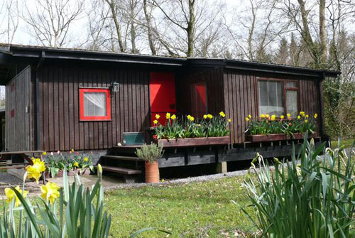 1970s Swiss-style wooden holiday lodge in Cenarth, Carmarthenshire, West Wales