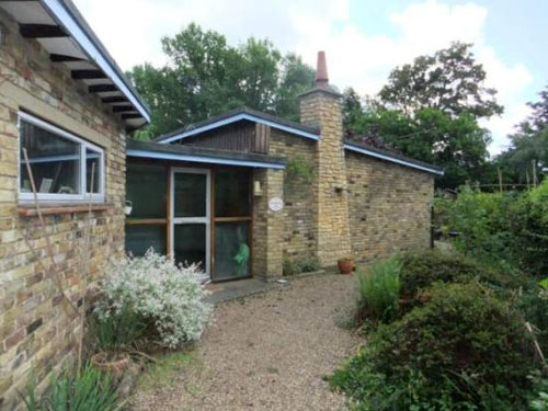 On the market: 1950s architect-designed four-bedroomed bungalow in Woking, Surrey