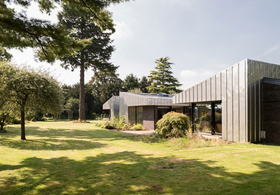 Remodelled 1960s modernist Wrap House in Godalming, Surrey